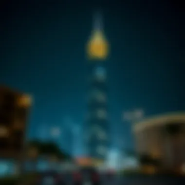 Al Jeel Tower: Illuminating Dubai's Urban Future Night view of Al Jeel Tower illuminated, symbolizing urban development