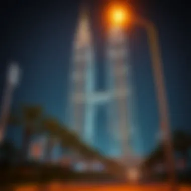 Night view of Al Barsha Twin Towers illuminated, symbolizing modernity