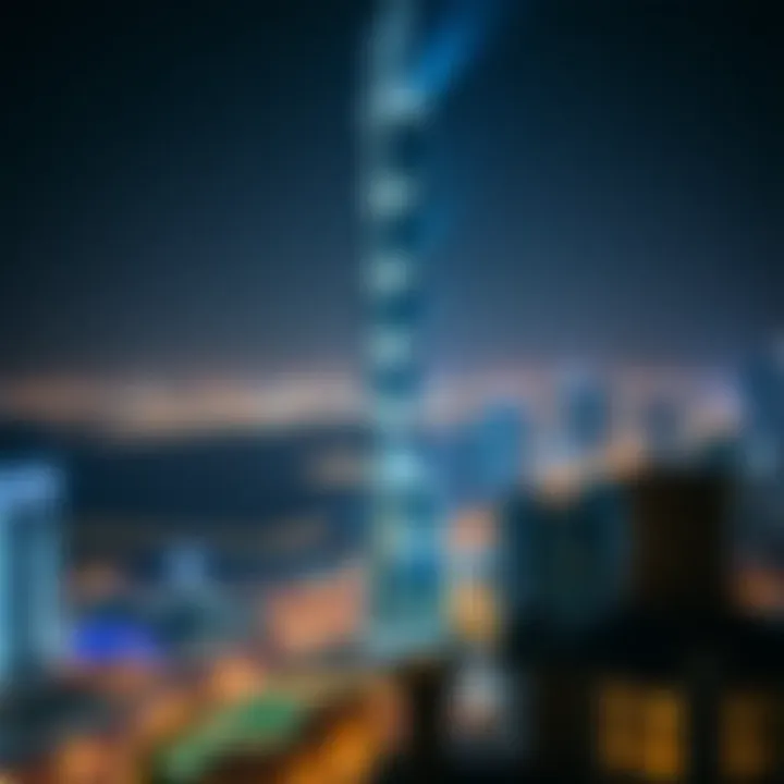 Night view of Creek Tower illuminated against a city skyline