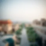 A panoramic view of Madinat Zayed Al Dhafra showcasing traditional architecture and modern buildings