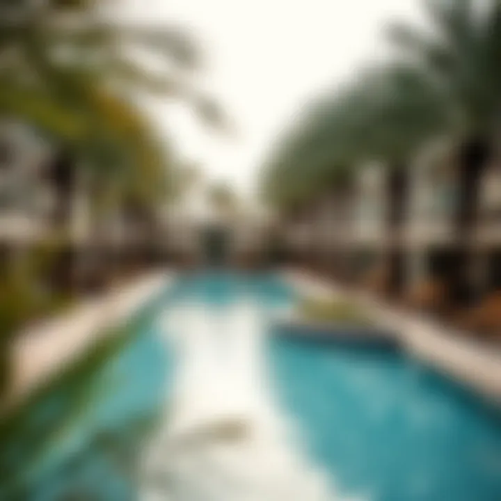 Relaxing pool area surrounded by palm trees at Swissotel